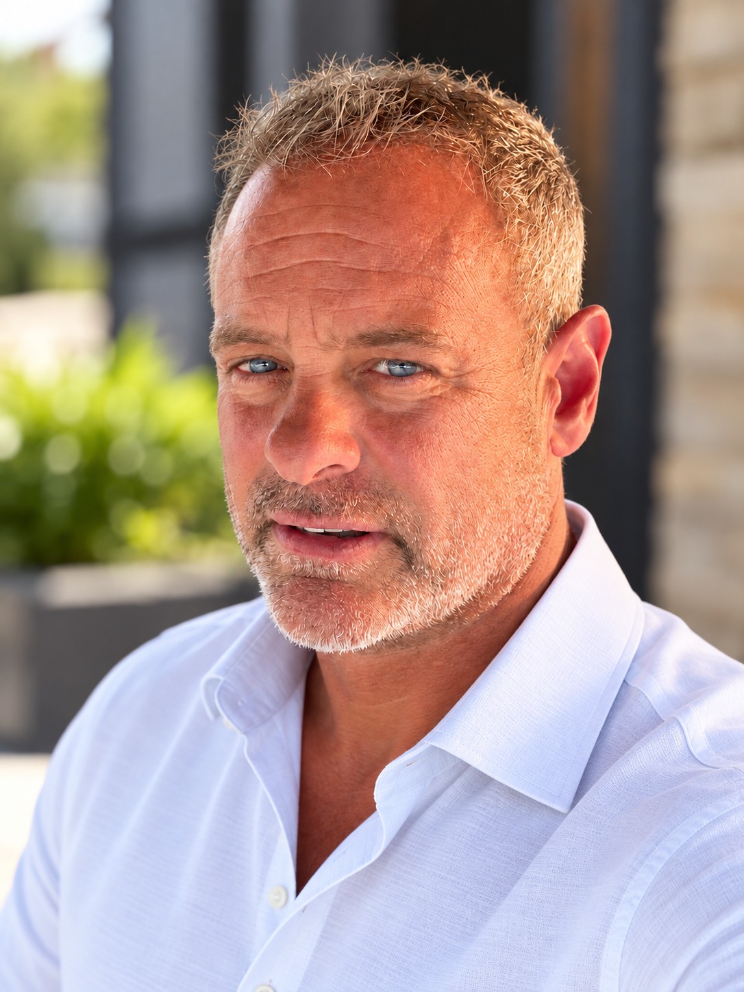 Scott Irvin, founder and president of Irvin, Inc., wearing a white collared shirt.
